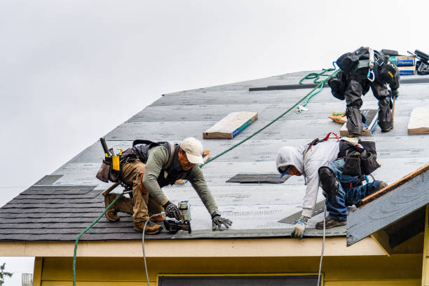 Professional Gutter Installation technician working in Saint Albans, VT
